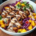 Jerk Chicken & Mango Slaw Bowls with Honey Lime Cream